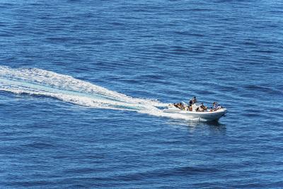 Motorized Dinghy with Young Adults on Board - Mediterranean Sea Italy